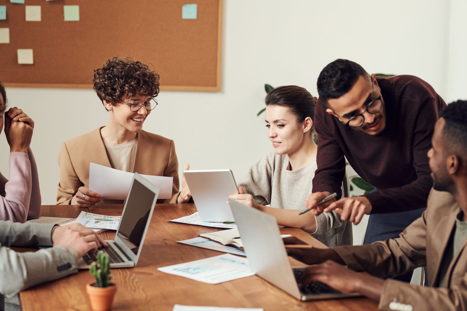 Colleagues reviewing work and ideas together at a desk